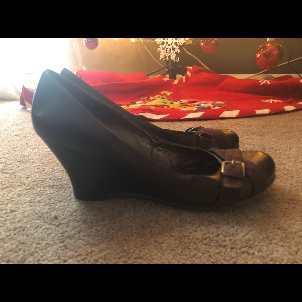 Brown leather platform heels by Aldo size 10.